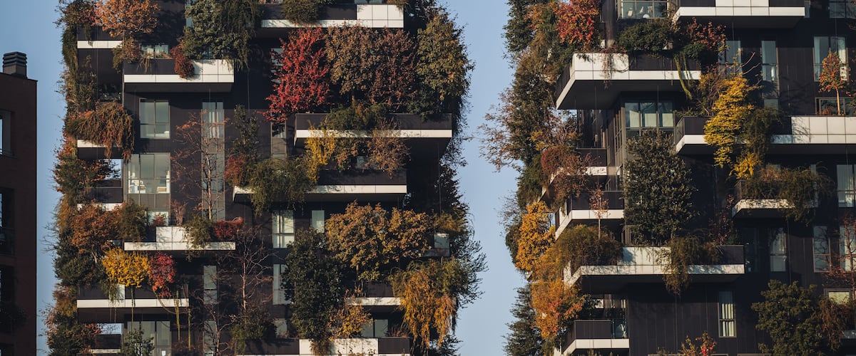 MILAN, ITALY- NOVEMBER 21, 2023 - "Bosco Verticale", vertical forest in autumn time, design apartments and buildings in the district "Isola" of the city of Milan, Italy