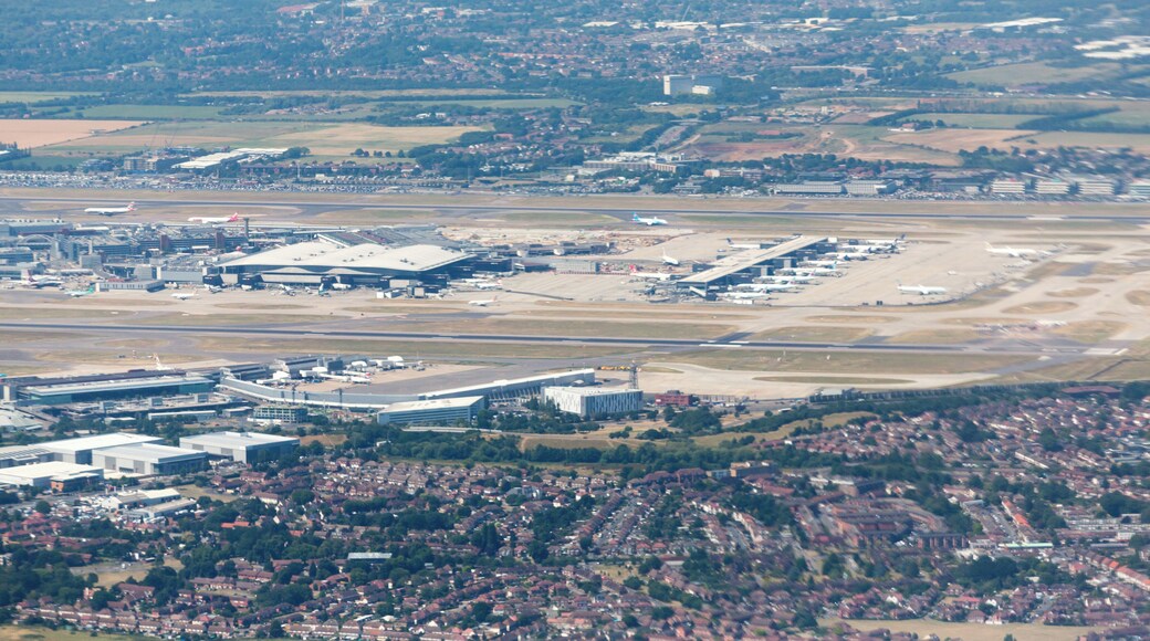 Aerial photograph of London taken on a Boeing 747-436 registration G-CIVG on departure from London Heathrow Airport (LHR/EGLL). Heathrow Terminal 4 is visible in the near foreground, with Terminals 1 (under reconstruction), 2, and 3 in the centre of the picture.