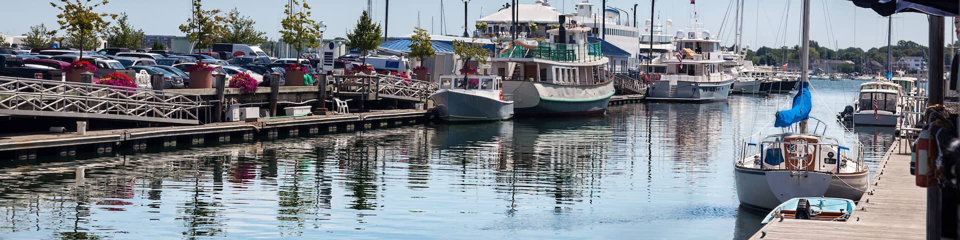 Summer lunchtime on Chandler's Wharf, looking over to Long Wharf, Portland, Maine