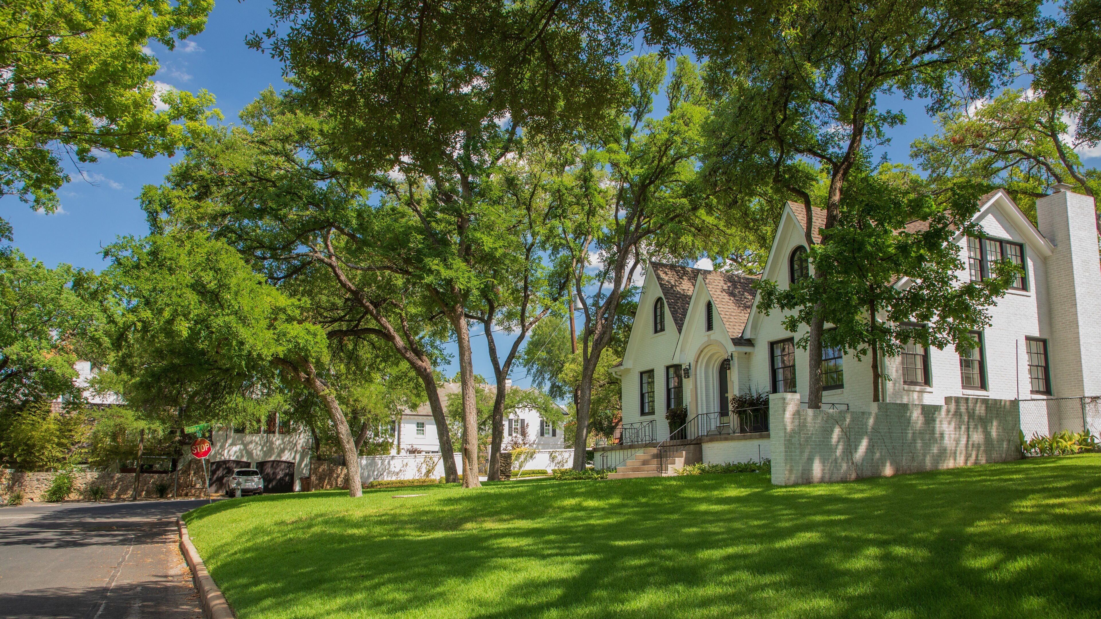 Old West Austin showing a house and a small town or village