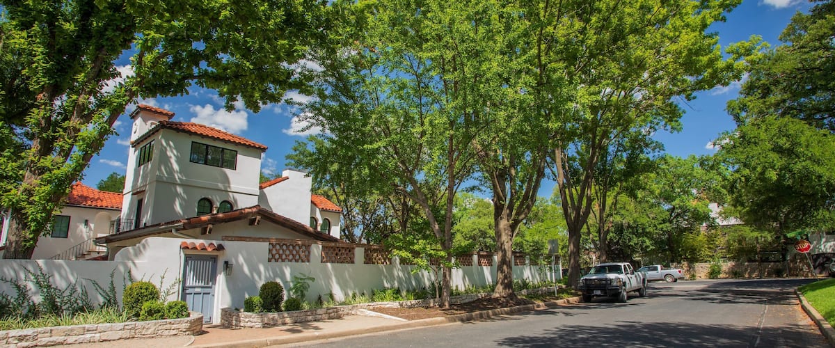 Old West Austin featuring a small town or village and a house