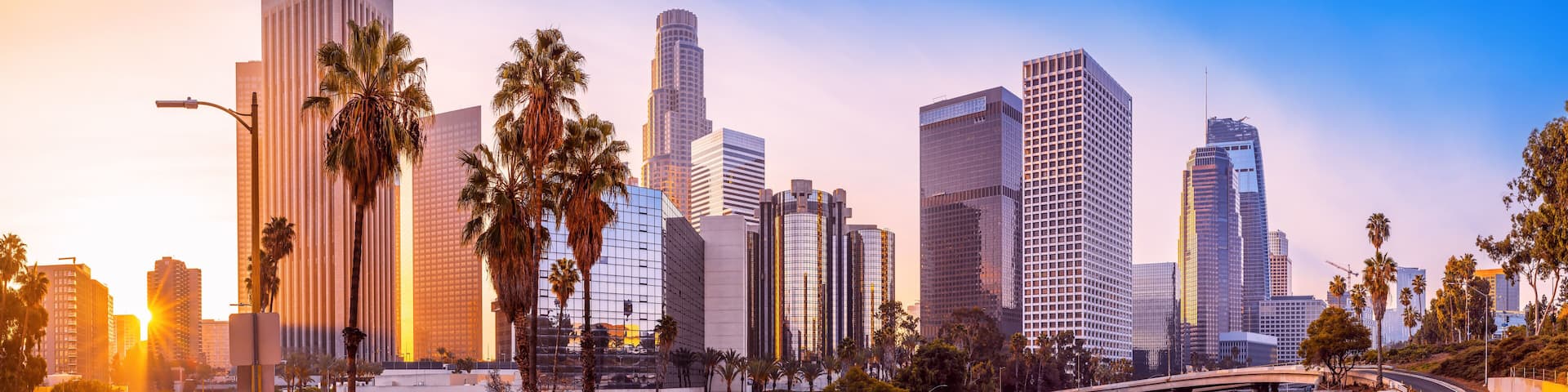 the skyline of los angeles during sunrise