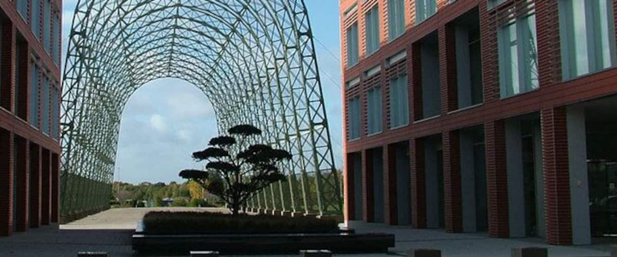 Historic temporary balloon shed frames Original frames for a temporary balloon shed from the very earliest days of flying have been erected as just a nice place for staff to rest or meet at Farnborough Business Park (part of Farnborough Airport.)