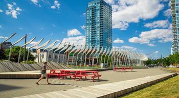 East Village showing street scenes and a high rise building