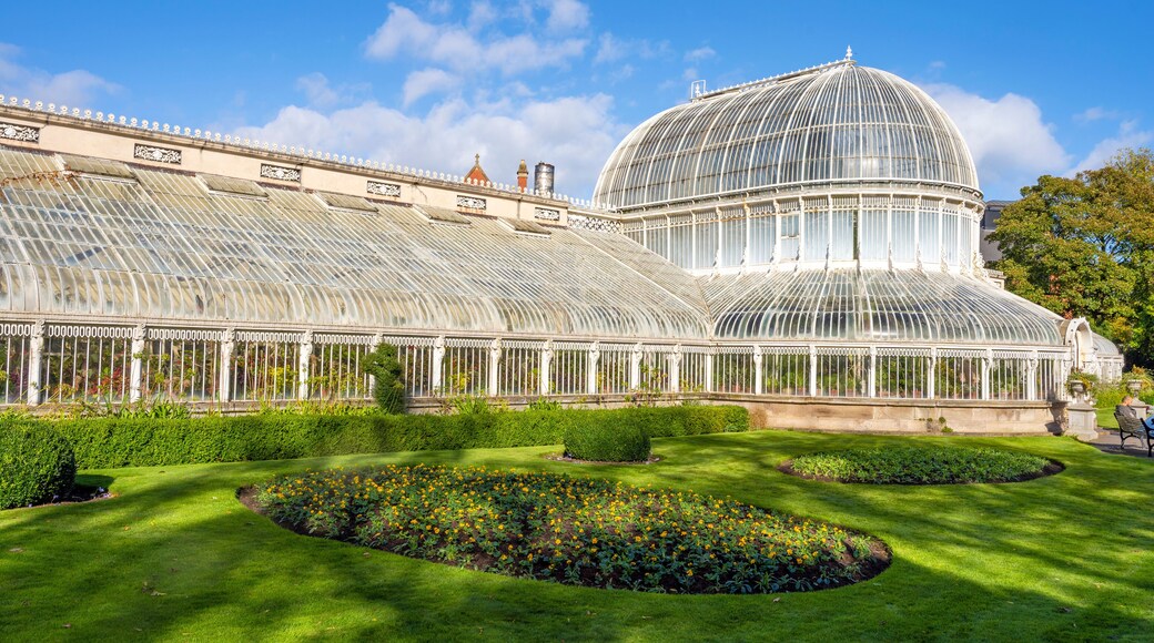 Exterior view of Palm House, a cast iron glasshouse designed in the 19th century by Charles Lanyon, in the Botanic Gardens near Ulster Museum, Belfast, Northern Ireland.