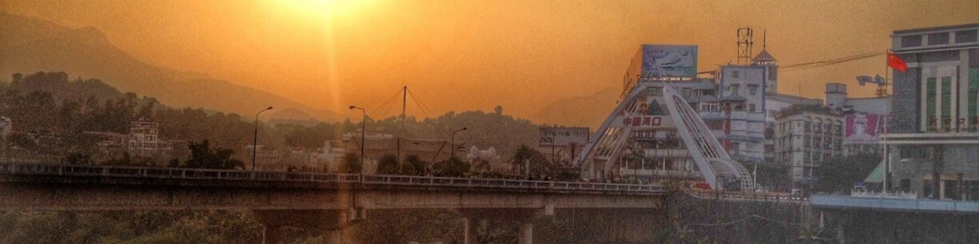 #TroveOn
This is looking at the bridge crossing from Lao Cai, Vietnam to Hekou, China. Apparently this is a place where it is fairly easy to cross going either way. The border opens at 7am in Vietnam which is also 8am in China. This is supposed to make it easy for shopping.