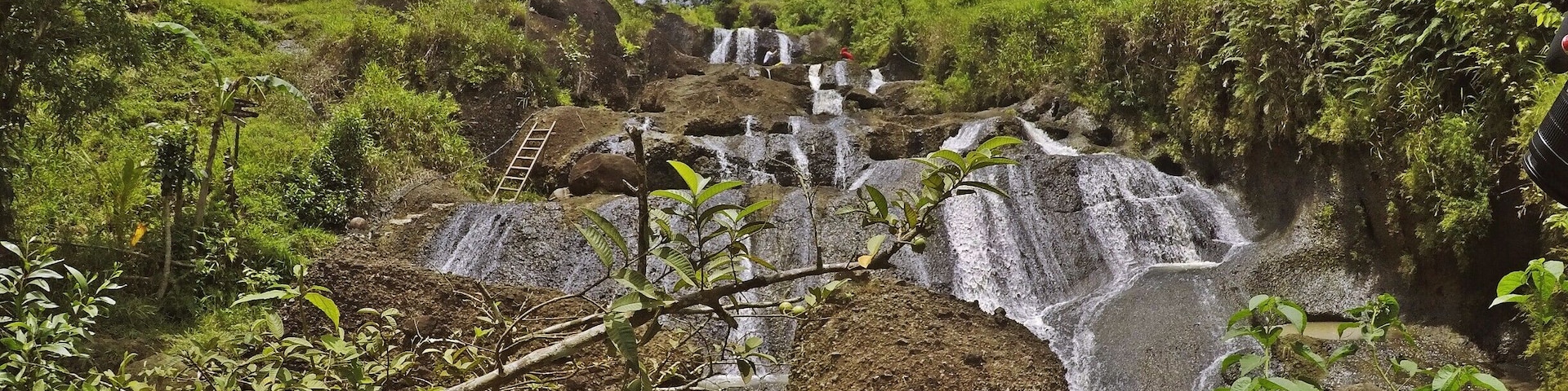 A 30 minute hike through a beautiful scenery of rice fields led us to this waterfall outside of Jogja.