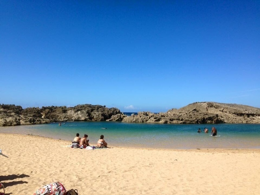 Playa Vega Baja, also known as Playa Puerto Nuevo and La Playa Sucia is a serene little beach sheltered from the windy North Atlantic swells by a quarter mile long natural rock wall. The waters are calm, clear, and shallow, perfect for snorkeling, swimming, and playing. There are some natural pools that form when sea water overtops the rock walls and provide a natural alternative for those afraid of the open waters. This is one of the best calm beaches within an hour of San Juan, and a favorite of locals. Thereâs plenty of parking and lots of vendors selling food, drink, and beach gear to visitors.
#puertorico