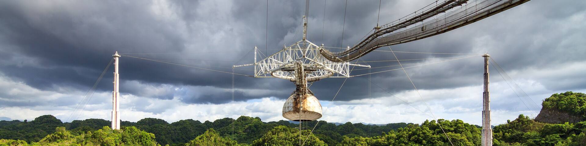 The Arecibo Observatory radio telescope in the hills of Arecibo, Puerto Rico