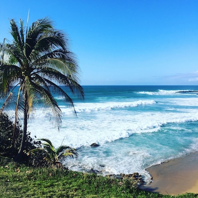 Domes beach in Rincon PR is a surfers dream, but it is also a great spot to relax and enjoy the beauty of the ocean.