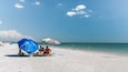 Lover\'s Key Beach which includes a beach and general coastal views as well as a small group of people
