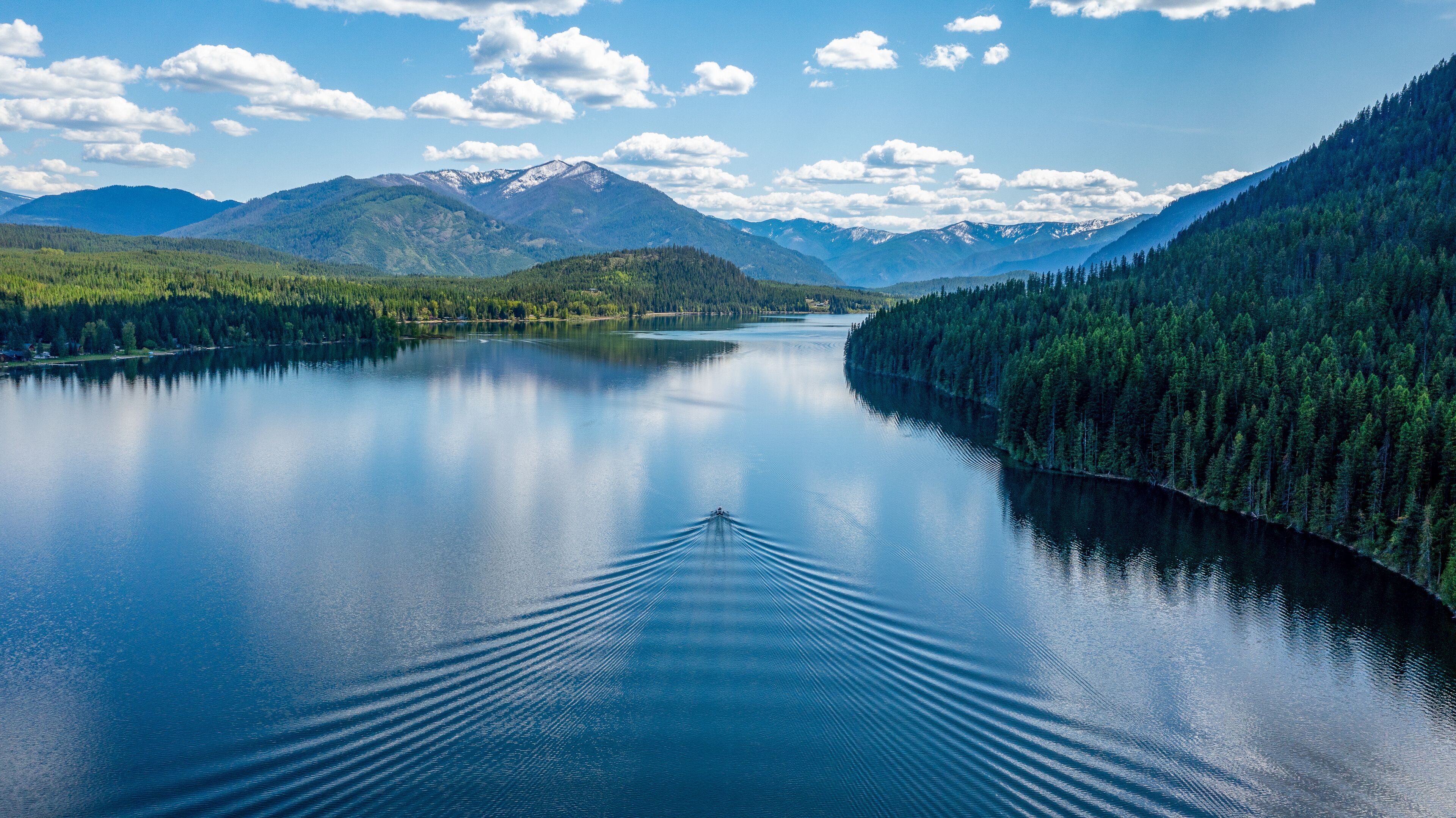 A afternoon capture of single boat on the beautiful Bull Lake in Northwest Montana.