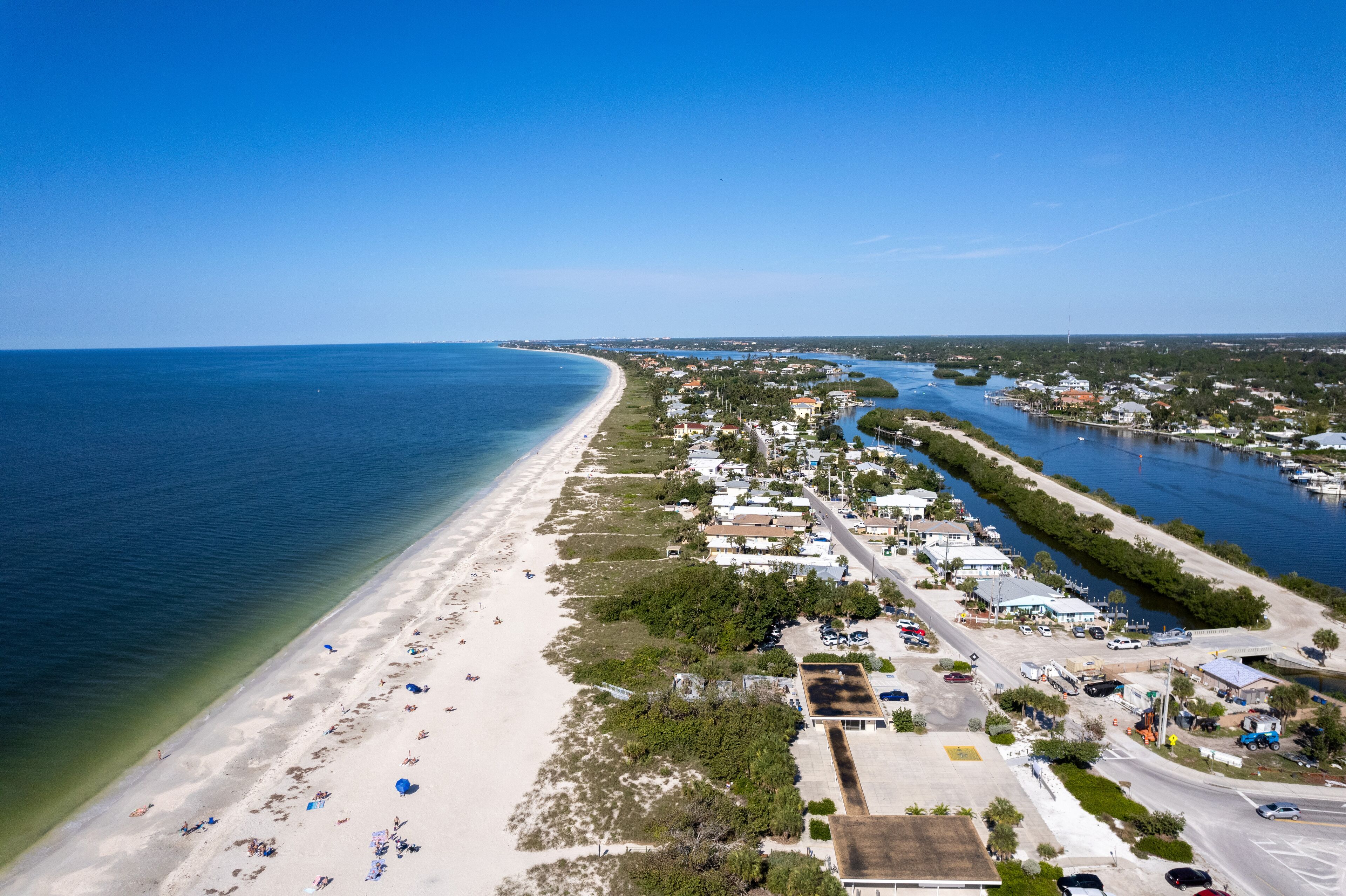 Aerial Drone Nokomis Beach. Gulf of Mexico on Casey Key in Nokomis Florida, United States. Red tide water.
