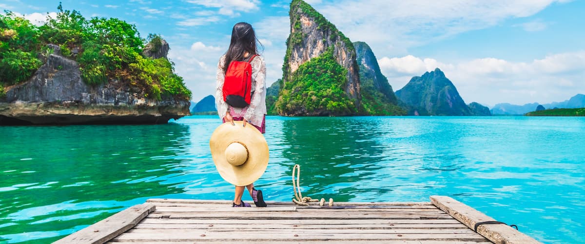 Adventure traveler young woman joy view beautiful destination island Phang-Nga bay, Famous landmark travel place Phuket Thailand, Tourism natural scenic landscape Asia, Tourist summer holiday vacation