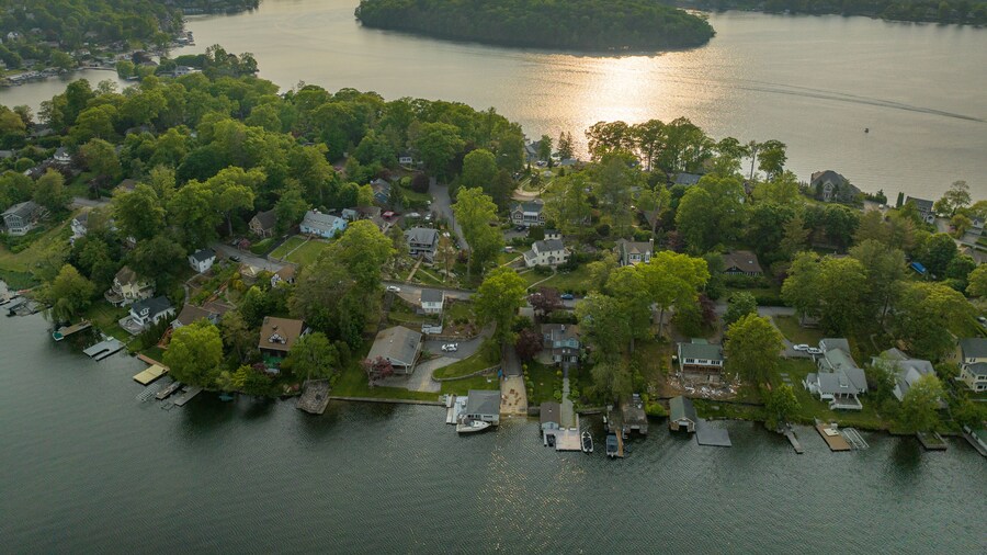 Late afternoon aerial photo of Lake Mahopac located in Town of Carmel, Putnam County, New York.