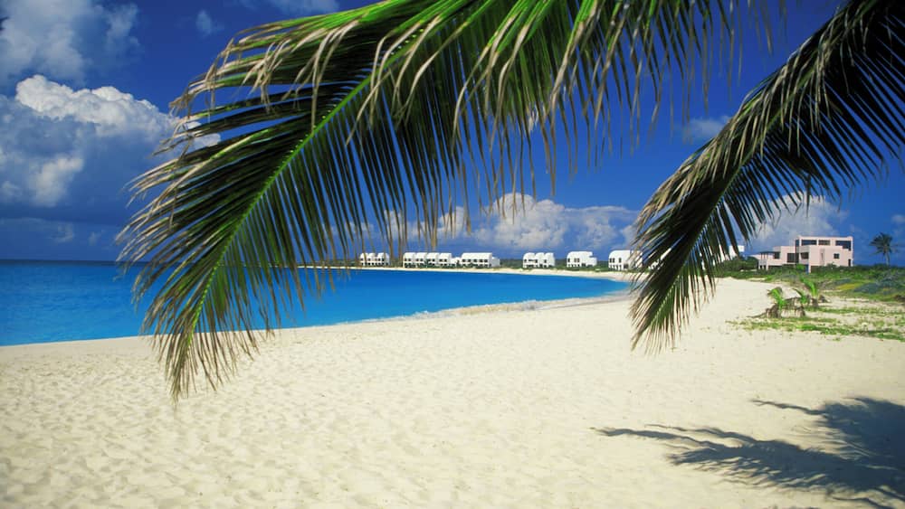 Distant view of Cove Castles Beach Resort on West Shoal Bay, Anguilla