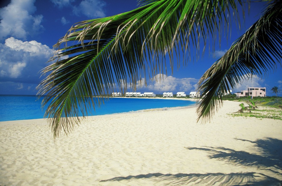 Distant view of Cove Castles Beach Resort on West Shoal Bay, Anguilla