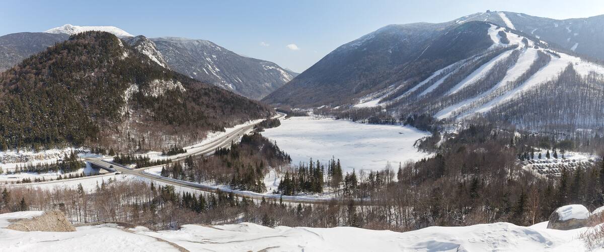 New Hampshire mountains - Cannon and Lafayette, Franconia Notch State Park. Snowy hills and rocks.