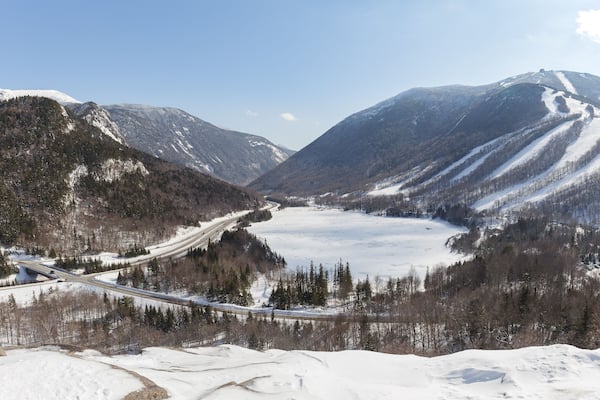 New Hampshire mountains - Cannon and Lafayette, Franconia Notch State Park. Snowy hills and rocks.