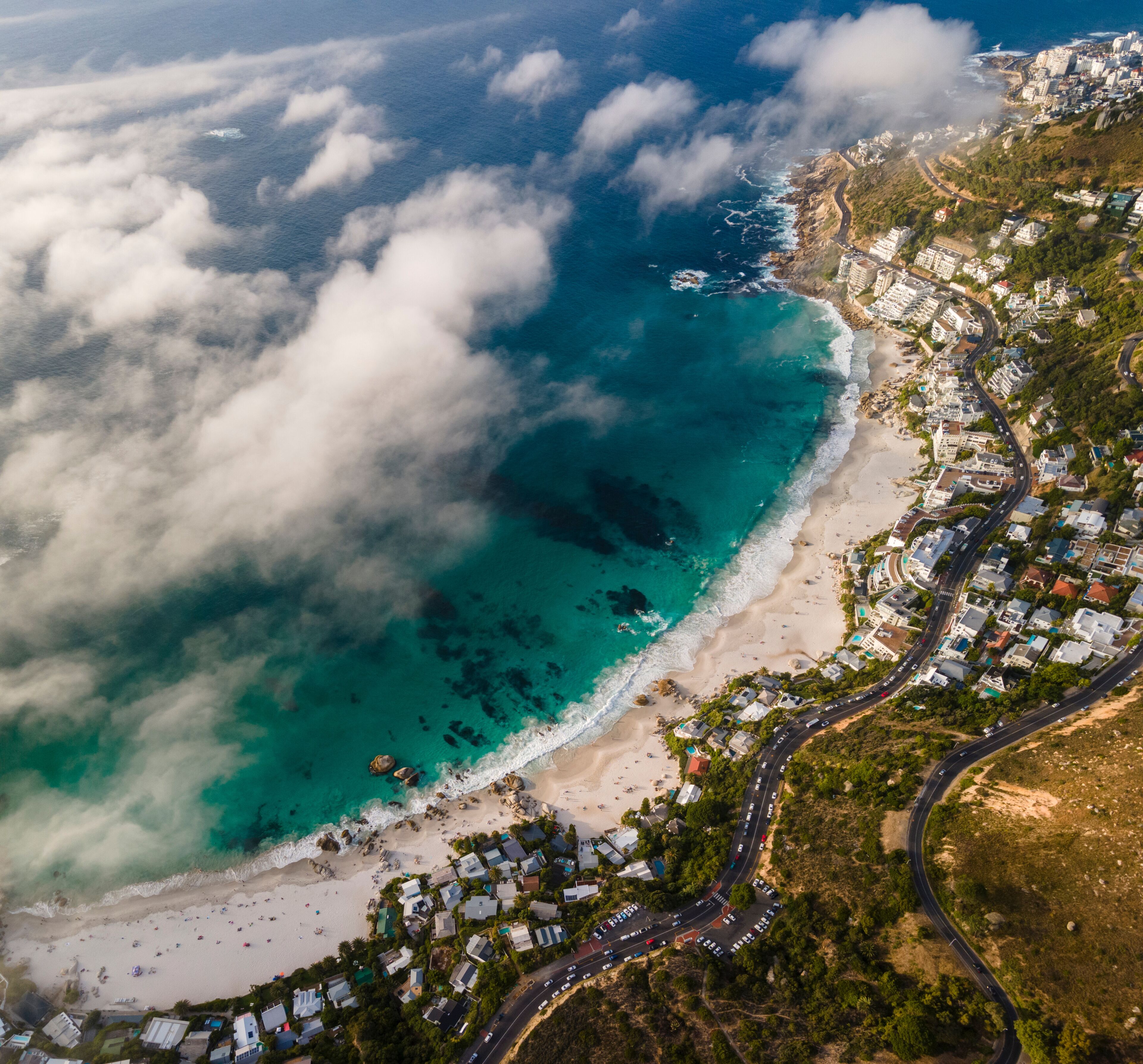 Panoramic aerial view of Clifton beach in low cloud, Cape Town, South Africa.