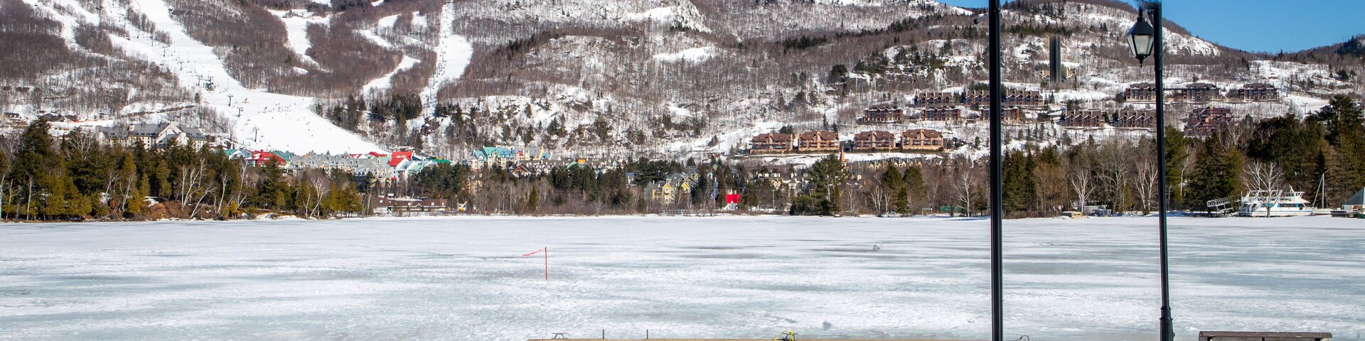 Lake Tremblant showing landscape views, snow and a lake or waterhole