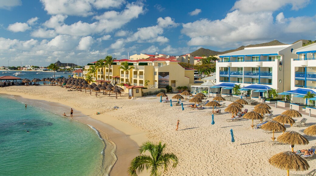 Pelican Key featuring a coastal town, general coastal views and a sandy beach