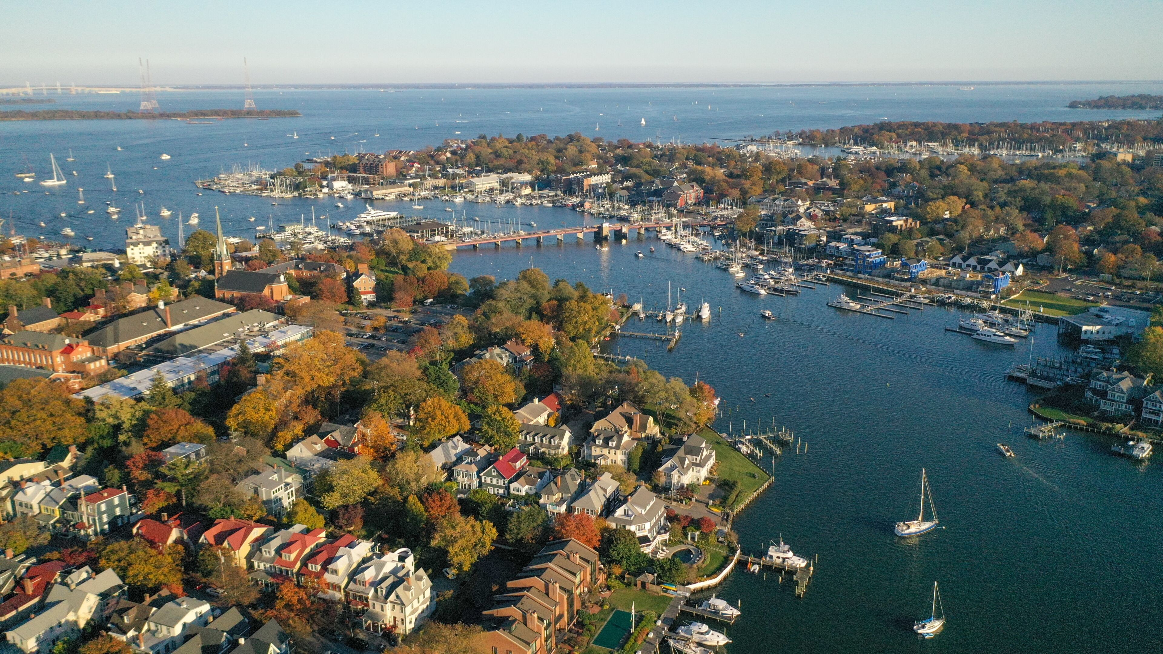 Aerial view of colorful sailboat moorings and docks on Spa Creek, in historic downtown Annapolis Maryland on a fall day