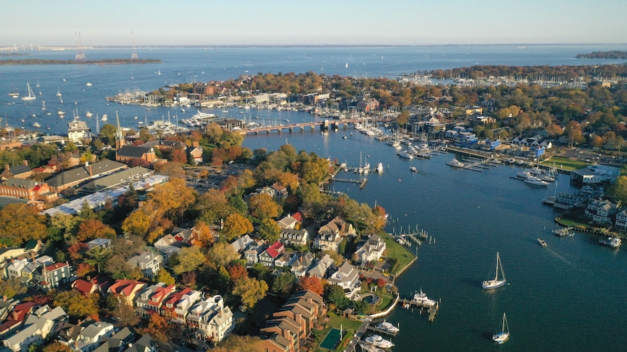 Aerial view of colorful sailboat moorings and docks on Spa Creek, in historic downtown Annapolis Maryland on a fall day
