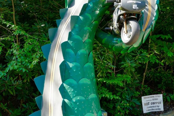 " Tail of the Dragon" 11 miles drive has over 300 curves , motorcycle enthusiasts use it daily for illegal racing and adrenaline rush