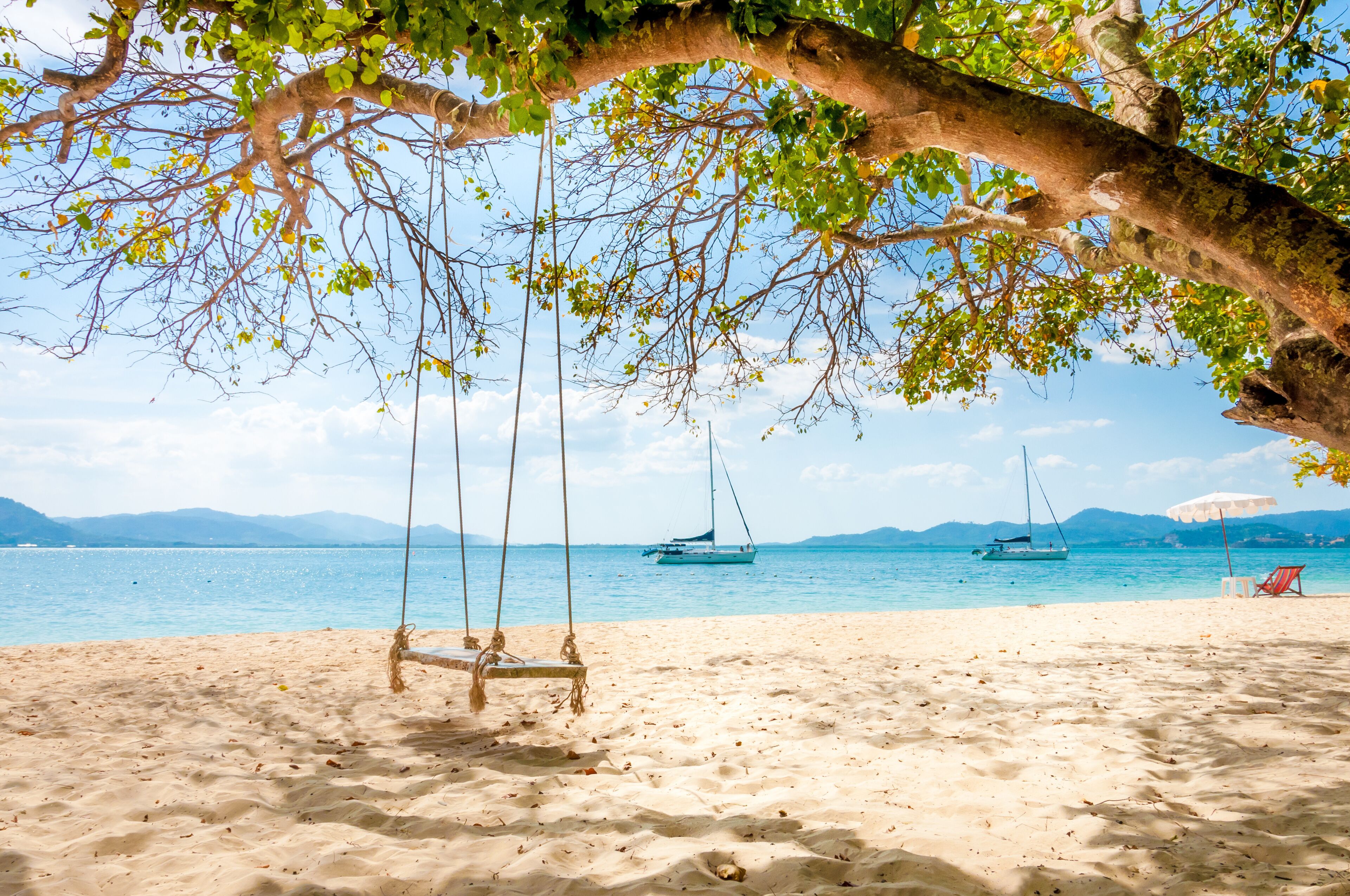 Swing hanging under the tree at Rang Yai island, Phuket, Thailand