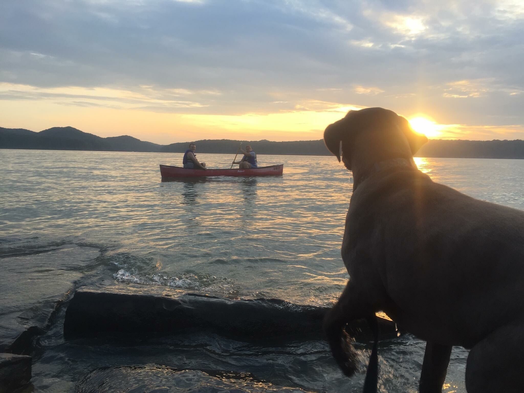 Watching my kids paddle in off the lake and enjoying a nice sunset. 