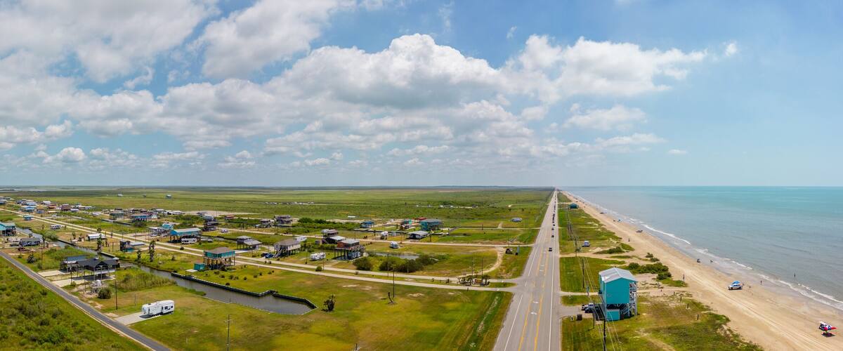 Aerial panorama coastal homes at Port Bolivar Beach Texas