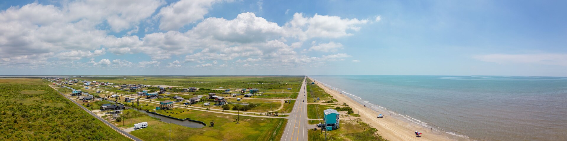 Aerial panorama coastal homes at Port Bolivar Beach Texas
