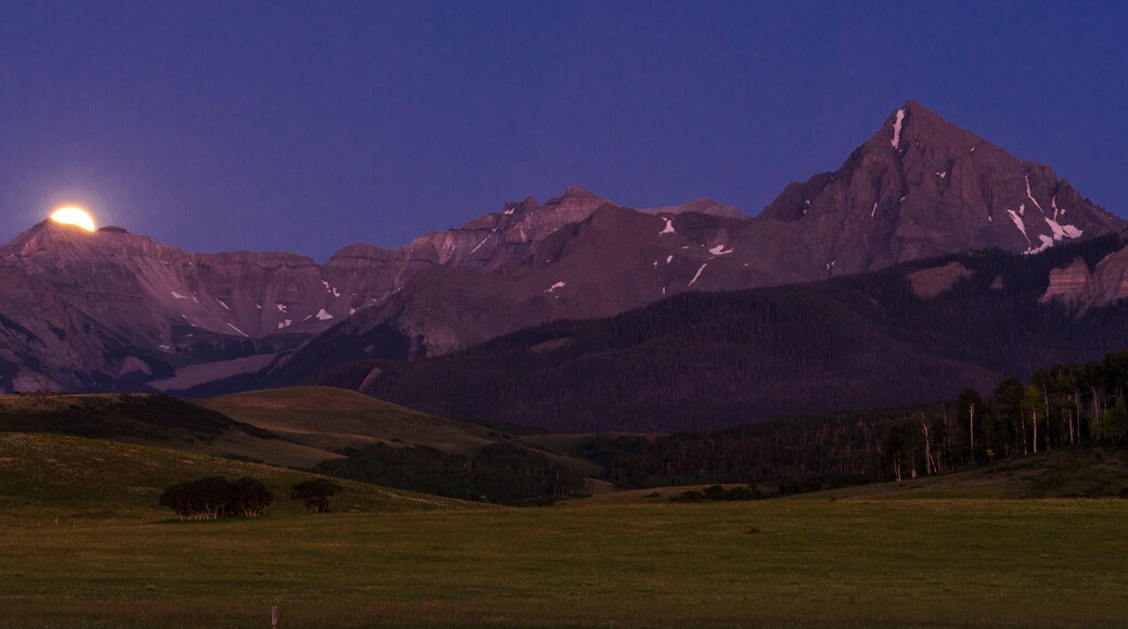 Full Moon rises over San Juan Mountains on Hastings Mesa, Colorado