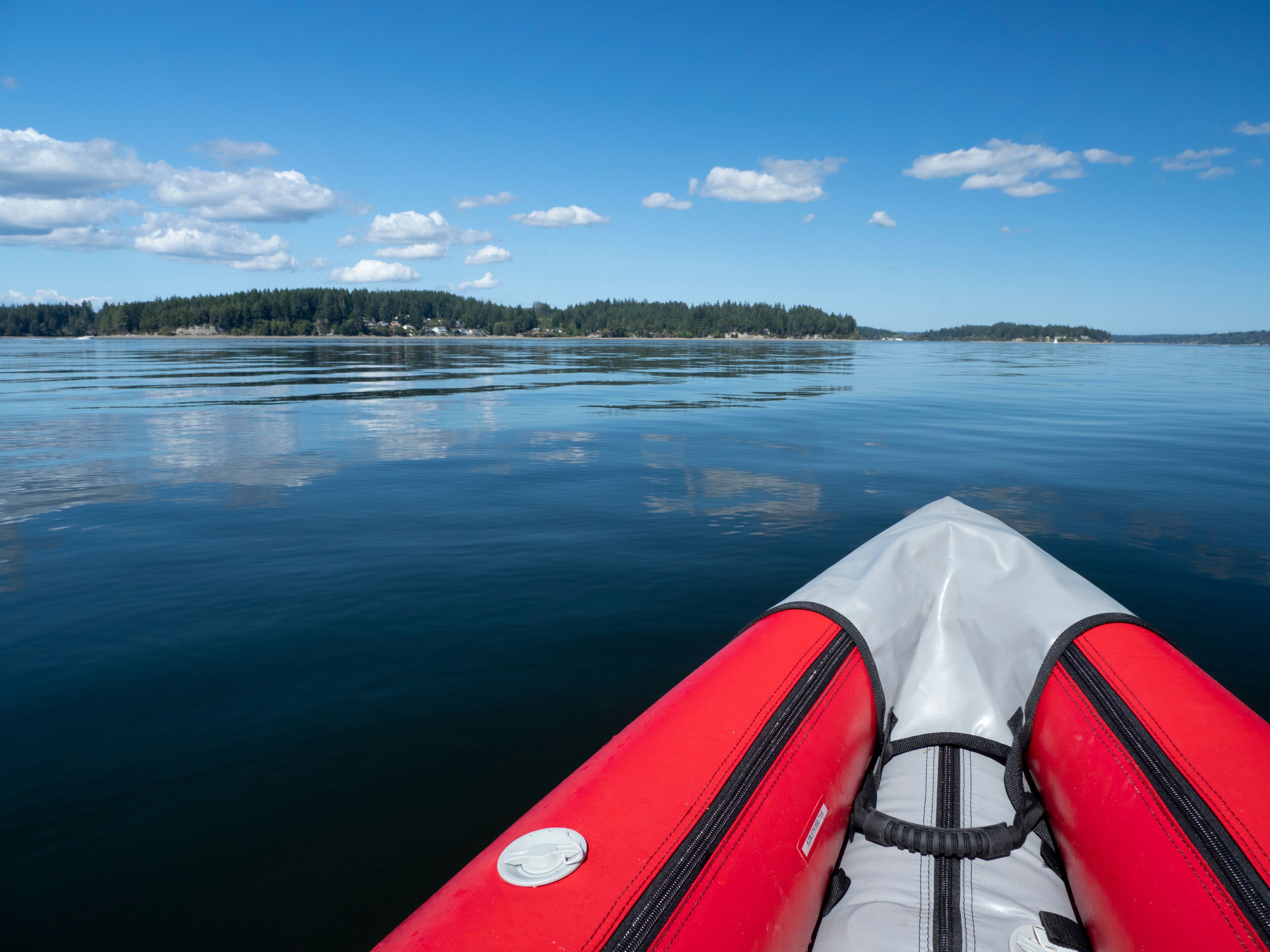 Usa, Washington State, Harstine Island, bow of inflatable kayak in water