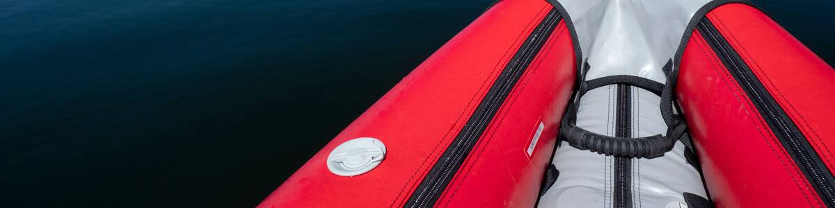 Usa, Washington State, Harstine Island, bow of inflatable kayak in water