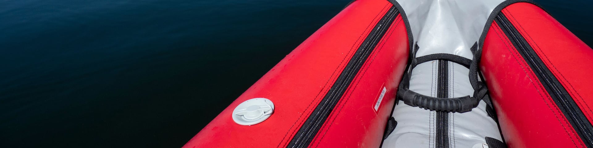 Usa, Washington State, Harstine Island, bow of inflatable kayak in water
