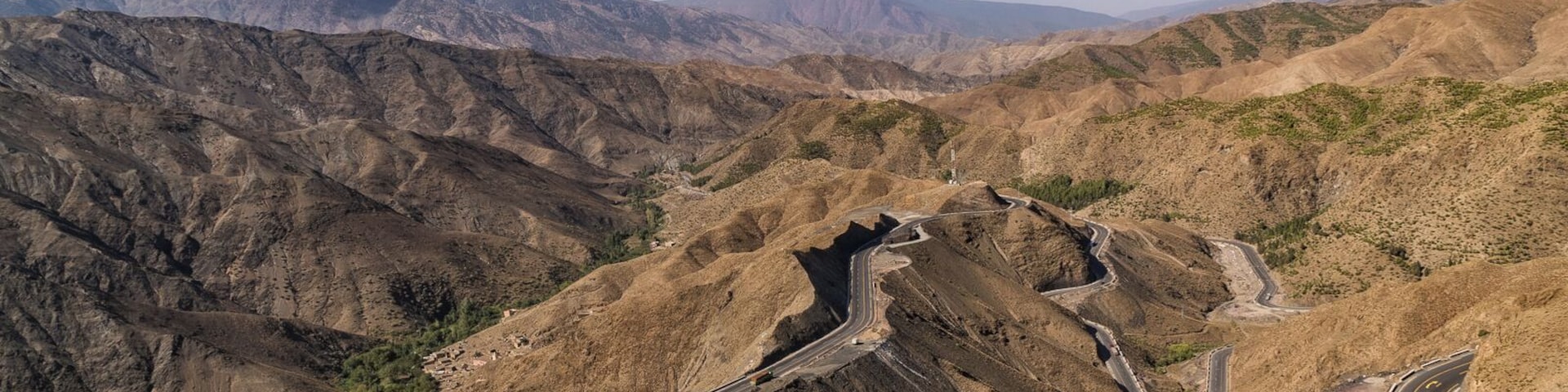 Driving the High Atlas mountains of Morocco. You can't expect to get from point A to point B very quickly on roads like this, so might as well enjoy the scenery.