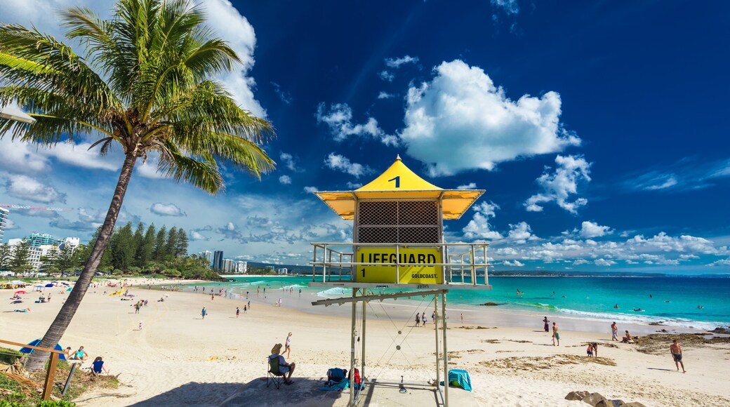 COOLANGATTA, AUS - MAY 01 2017, Snappers rock and Rainbow Bay beach with lifeguard tower, Gold Coast, Australia