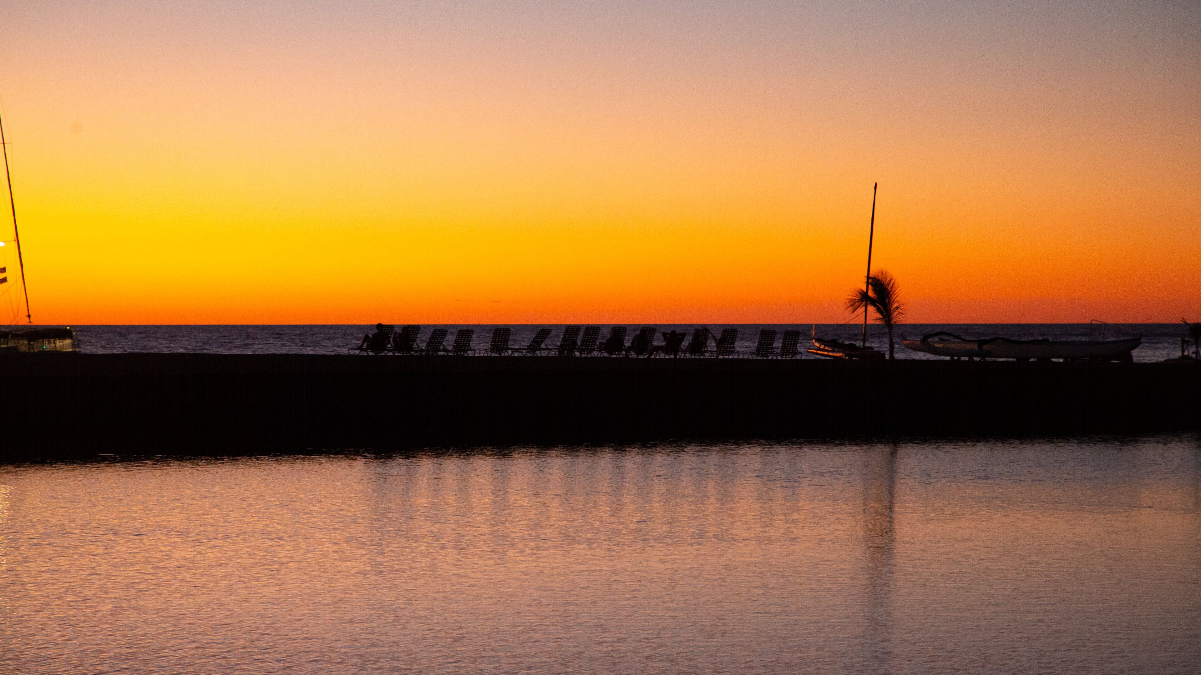 Anaehoomalu Beach featuring general coastal views and a sunset