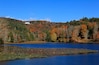 Cone Manor House near Blowing Rock, NC in the distance with Bass Lake in the foreground