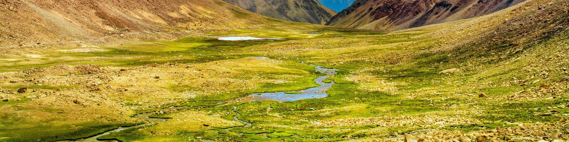 Beautiful mountains view with little stream from melting snow, way to Pangong lake, Ladakh, India