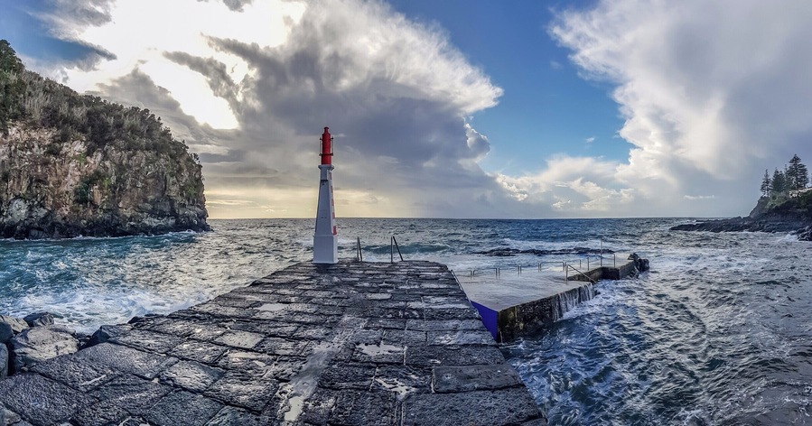 From the port of Caloura between heavy showers and sunshine. Not the day to take a swim.