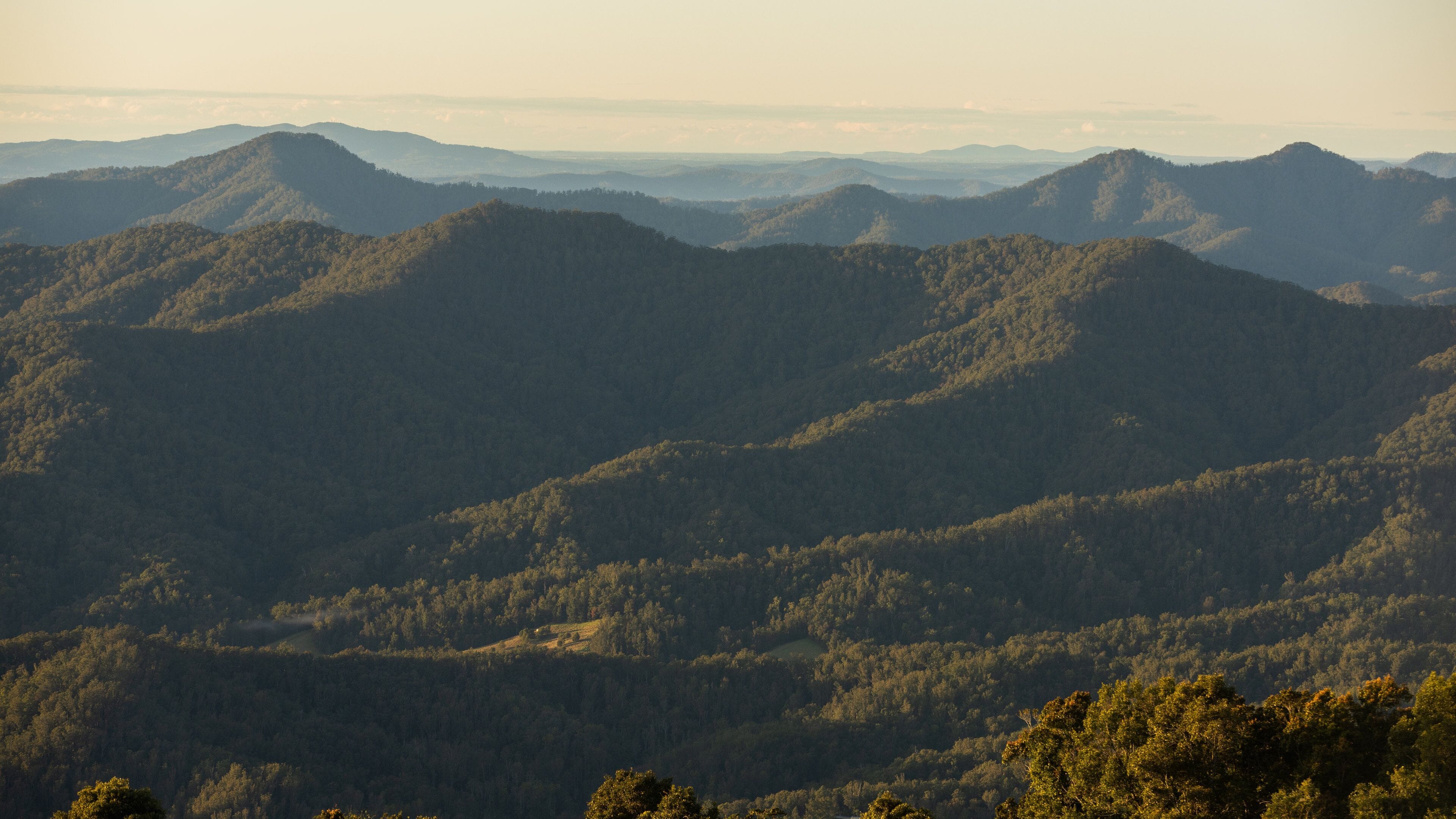 Griffiths Lookout which includes a sunset, mountains and tranquil scenes