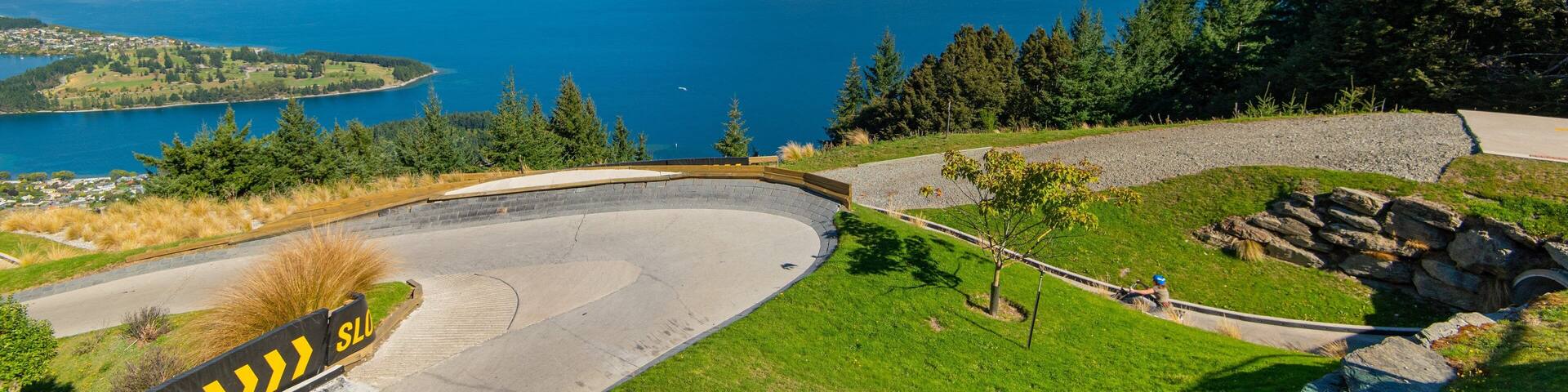 Skyline Luge featuring a lake or waterhole and landscape views