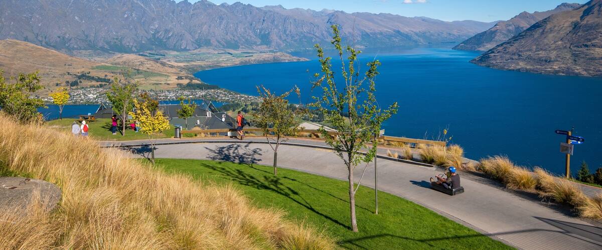 Skyline Luge which includes landscape views and a lake or waterhole
