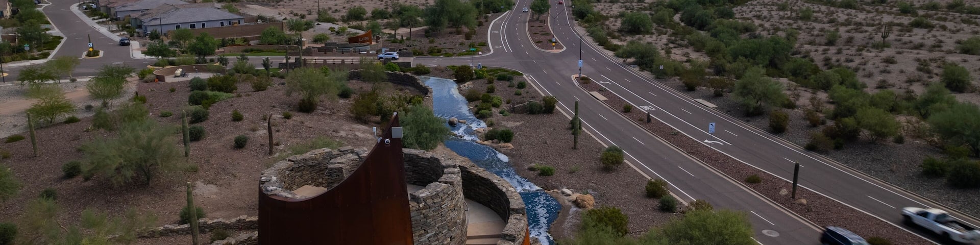 Aerial view of Estrella Star Tower by the highway in the countryside in Goodyear, Arizona
