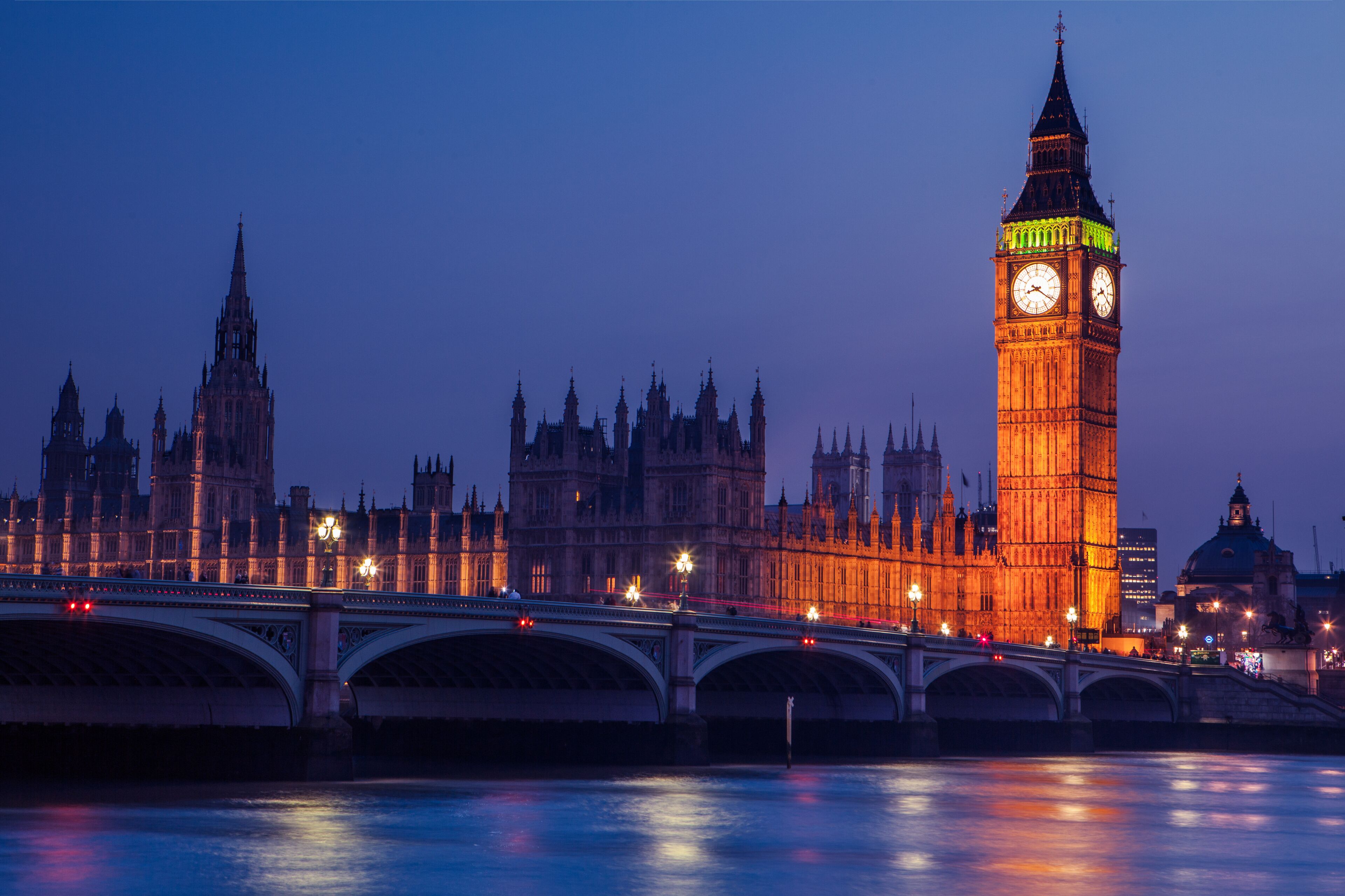 Big Ben in Westminster on River Thames, London at night