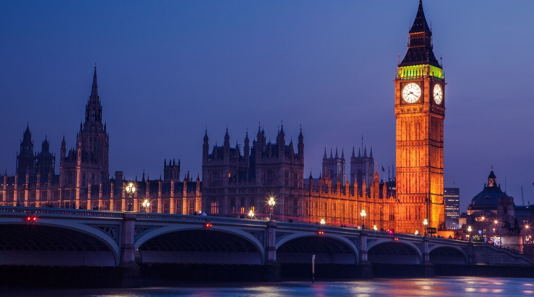 Big Ben in Westminster on River Thames, London at night