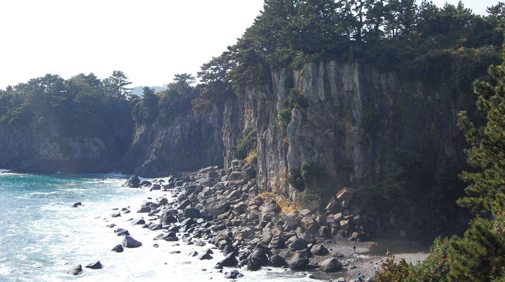 Near the Jeongbang Waterfall 정방폭포. The waterfall is 23 meters high and is very close to the ocean.